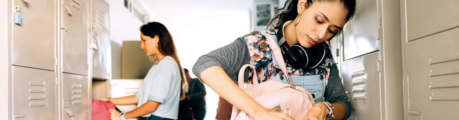 TB test for college, female student packing stuff in front of the locker, QFT